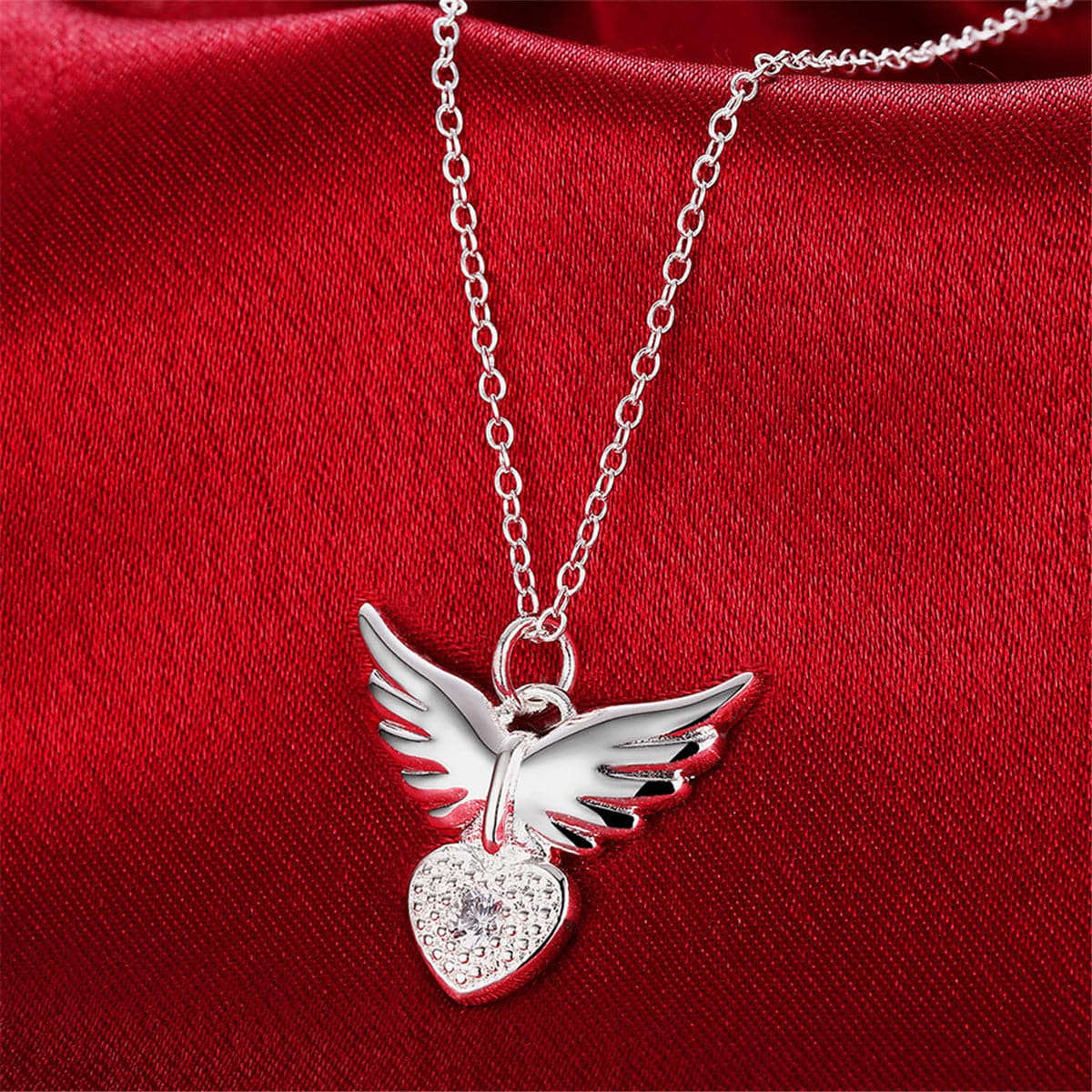 Cubic Zirconia & Silvertone Flying Heart Pendant Necklace