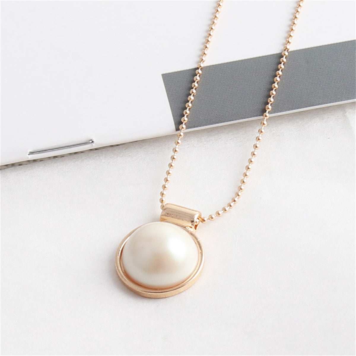 Pearl & Goldtone Round Pendant Necklace