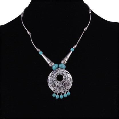Turquoise & Silvertone Round Pendant Necklace