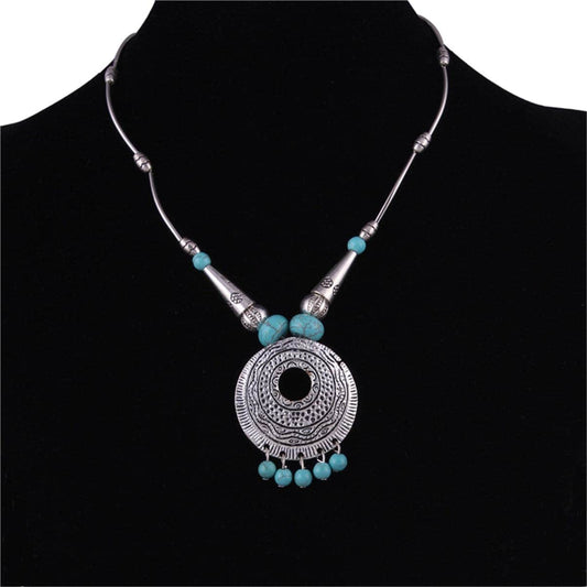 Turquoise & Silvertone Round Pendant Necklace
