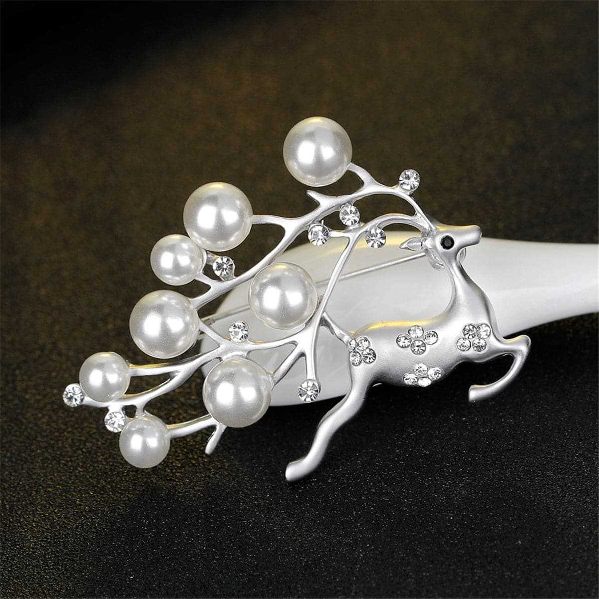 Cubic Zirconia & Pearl Dashing Reindeer Brooch