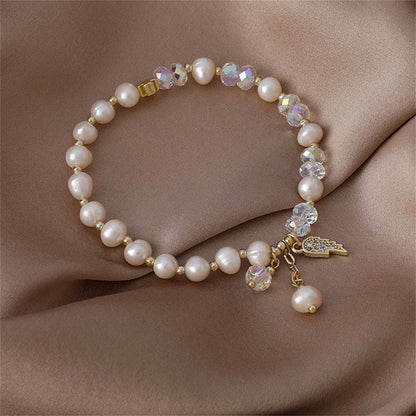 Pearl & Cubic Zirconia Goldtone Wing Charm Stretch Bracelet