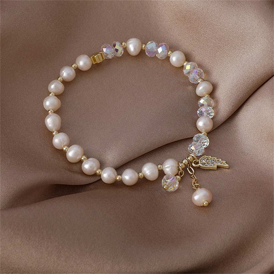 Pearl & Cubic Zirconia Goldtone Wing Charm Stretch Bracelet