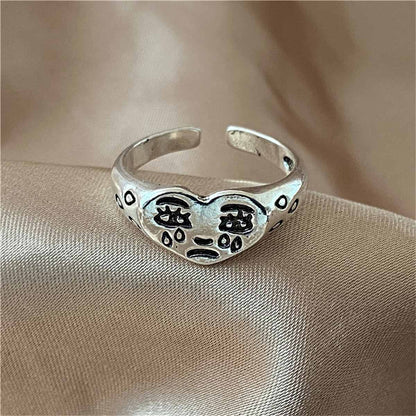 Silvertone Crying Heart Open Band Ring