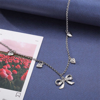 Silvertone Bow Heart Station Necklace