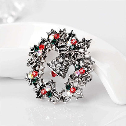 Cubic Zirconia & Silvertone Bell Wreath Brooch