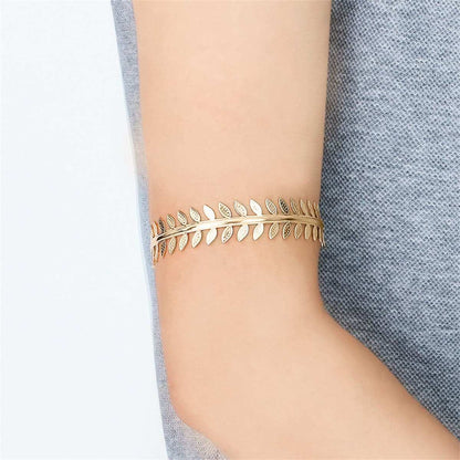 Goldtone Leaves Bypass Arm Cuff