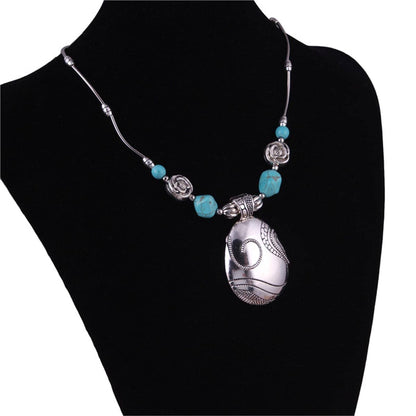 Turquoise & Silvertone Floral Teardrop Necklace
