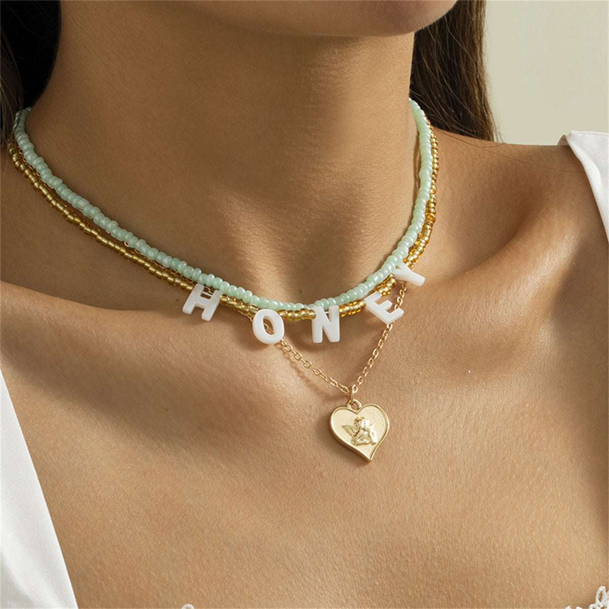 Howlite & Acrylic Goldtone 'Honey' Angel Heart Pendant Necklace Set