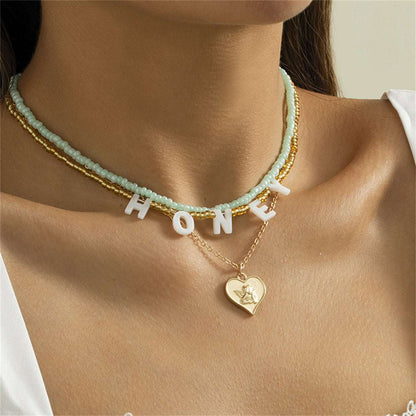 Howlite & Acrylic Goldtone 'Honey' Angel Heart Pendant Necklace Set