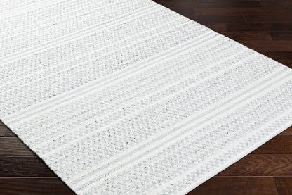 Kendi Cream Area Rug