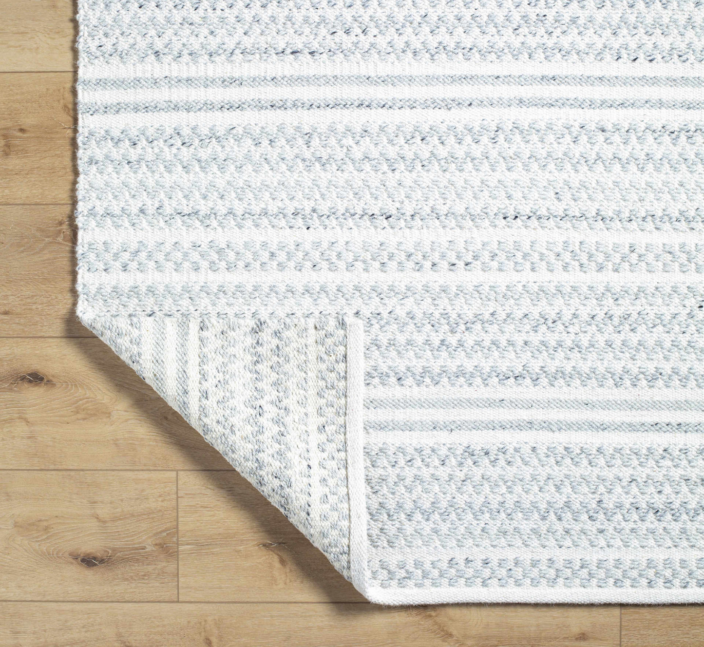 Kendi Cream Area Rug