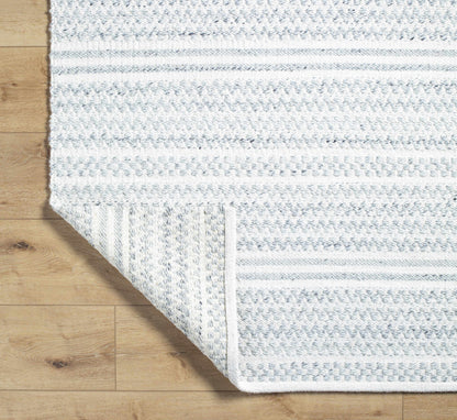 Kendi Cream Area Rug