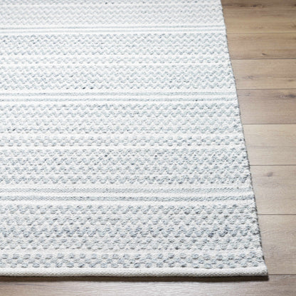 Kendi Cream Area Rug