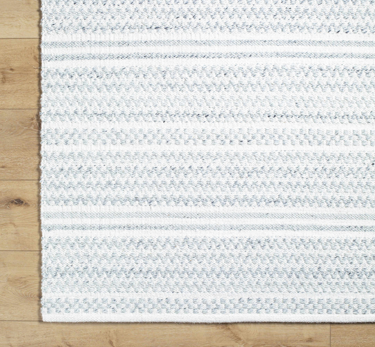 Kendi Cream Area Rug