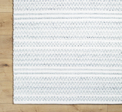 Kendi Cream Area Rug