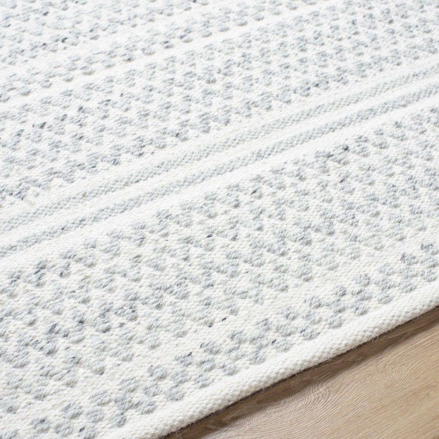 Kendi Cream Area Rug