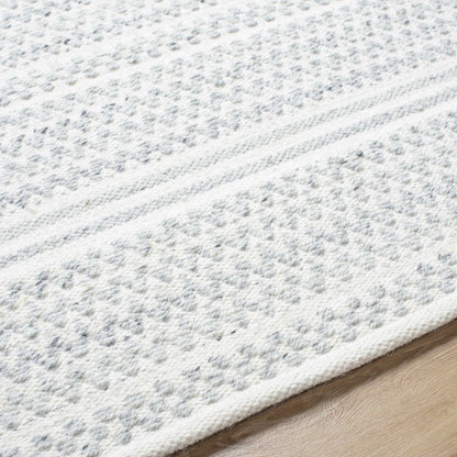 Kendi Cream Area Rug