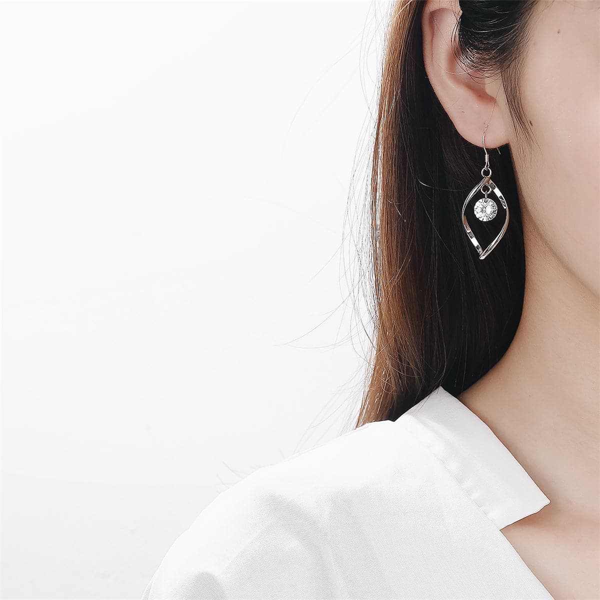 Cubic Zirconia & Silvertone Twisted Drop Earrings