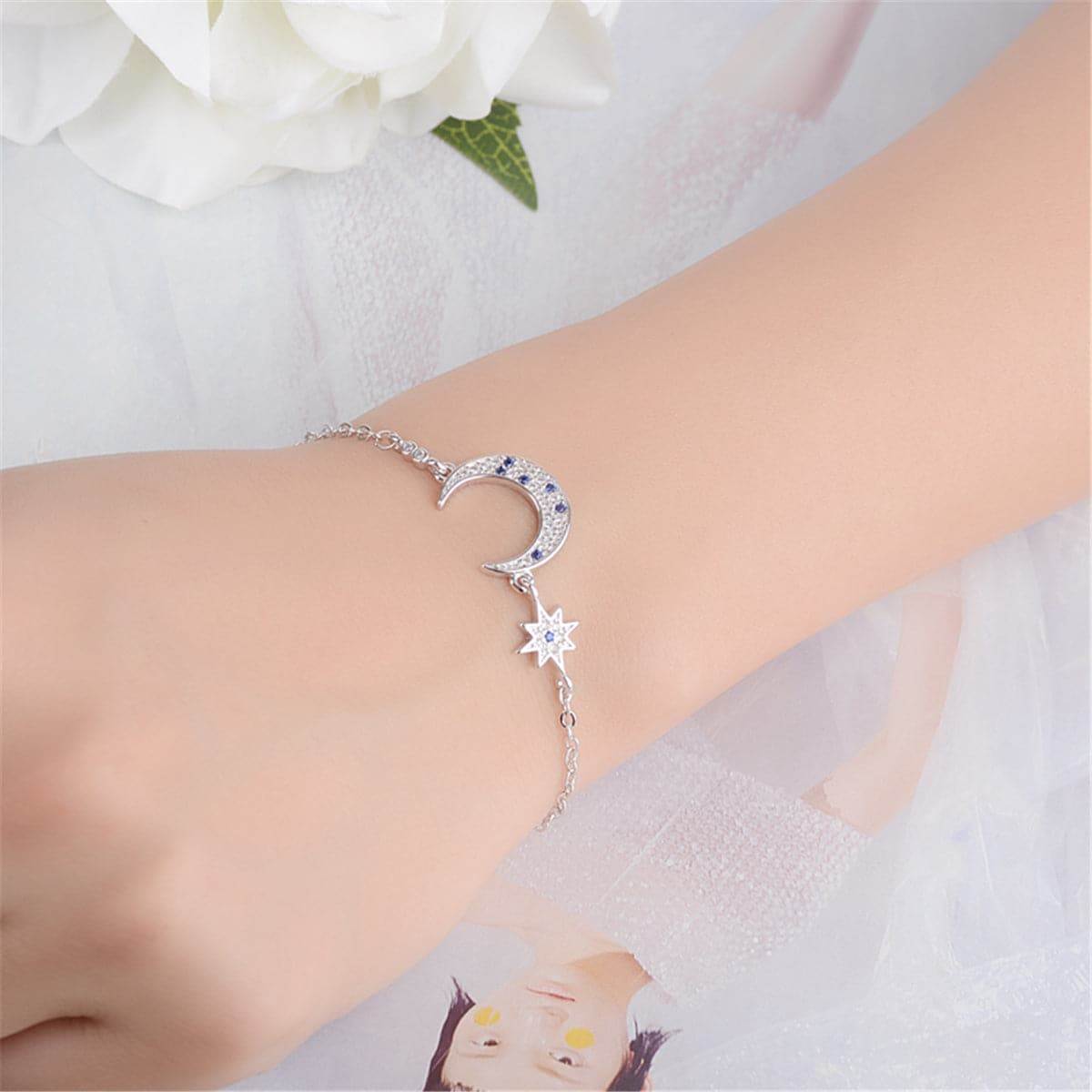 Blue Crystal & Silvertone Star & Crescent Moon Bracelet