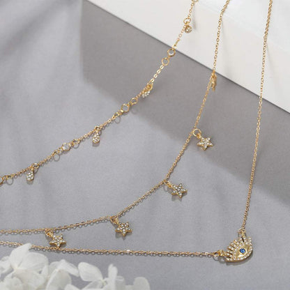 Cubic Zirconia & Goldtone Star & Eye Layered Necklace