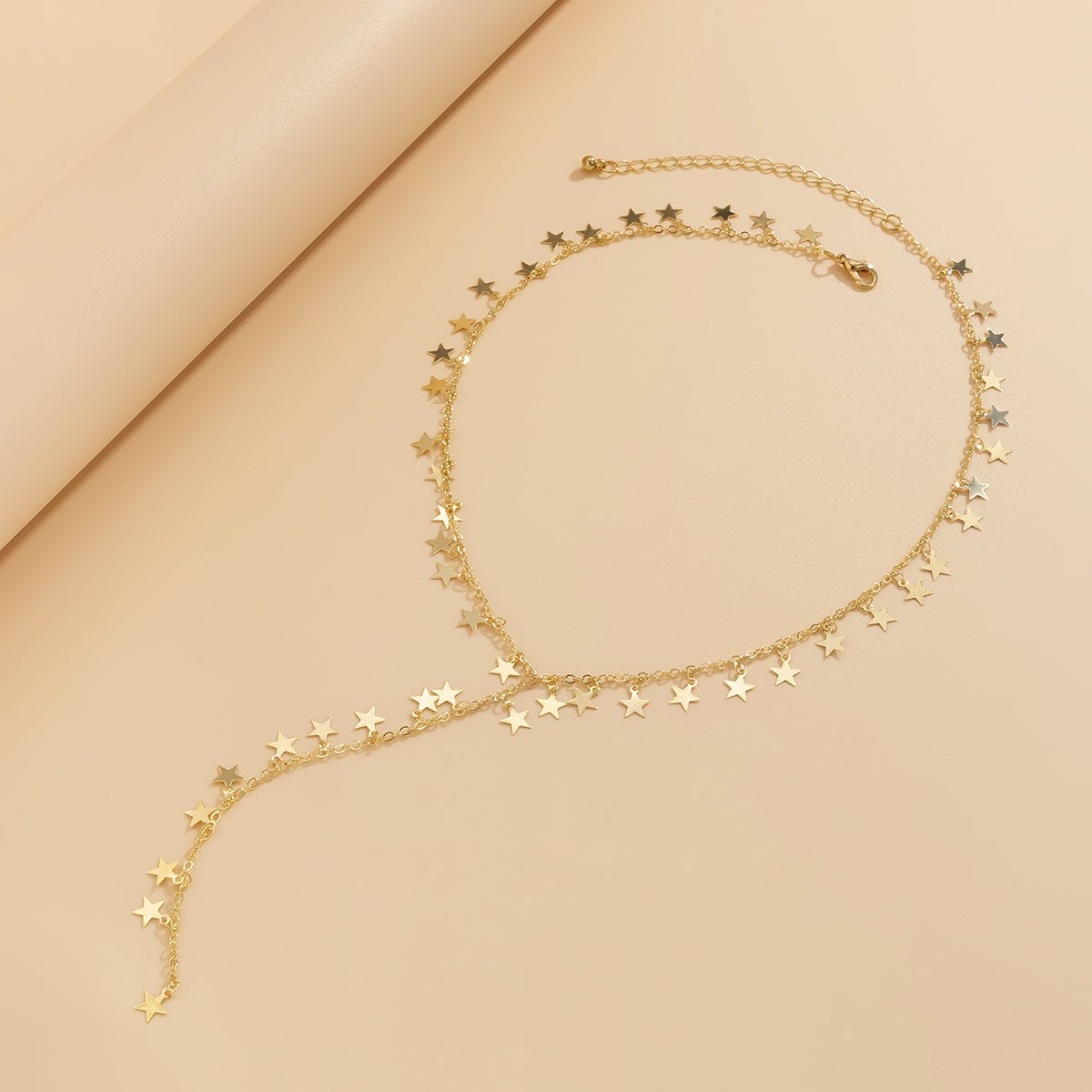 Goldtone Star Charm Lariat Necklace