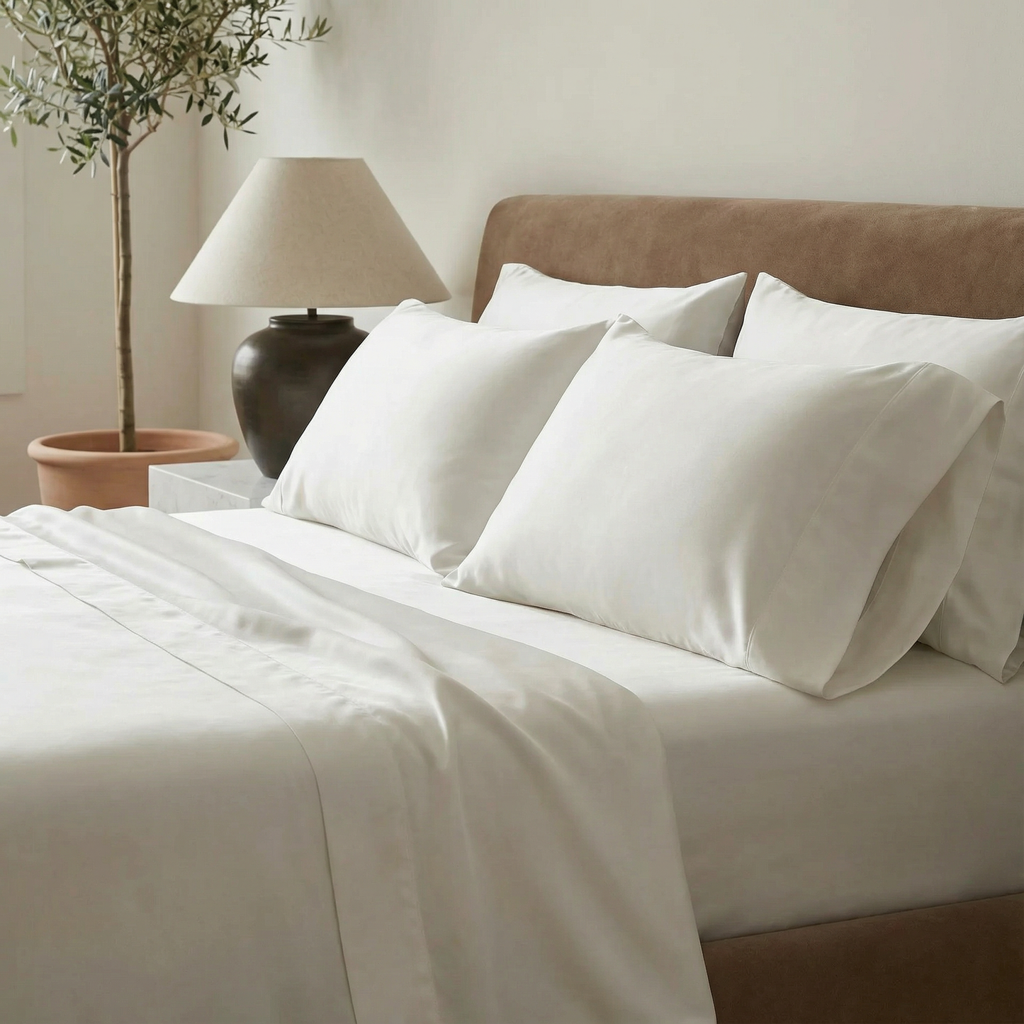 Minimal bedroom featuring cloud-white bamboo pillowcases