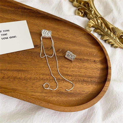 Silvertone Abstract Wrinkled Stud & Tassel Earrings