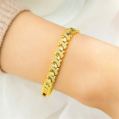 Goldtone Floral Swirl Chain Bracelet