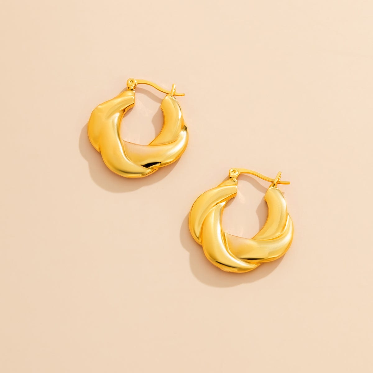 Goldtone Twist-Accent Huggie Earrings