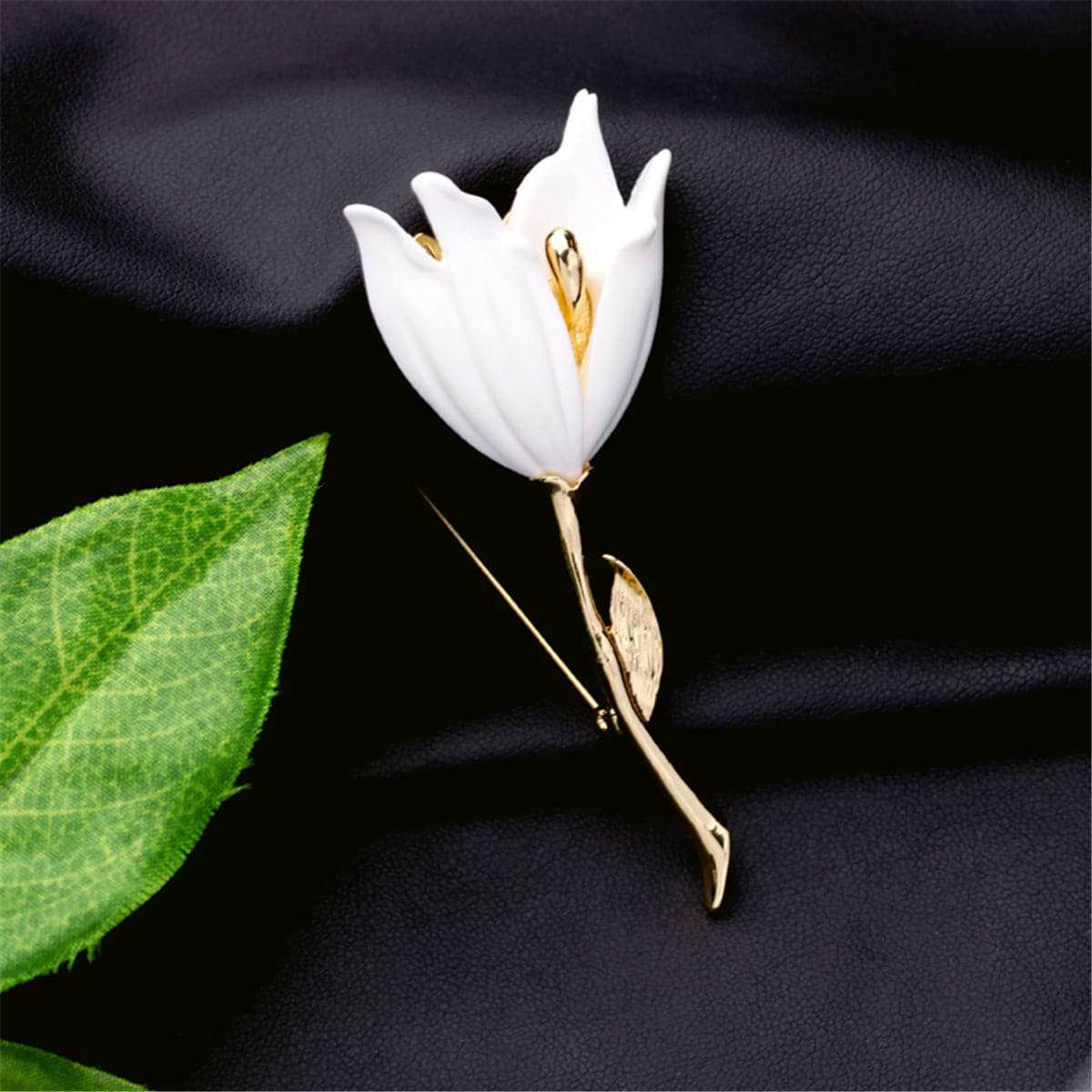 White Resin & Goldtone Lily Brooch