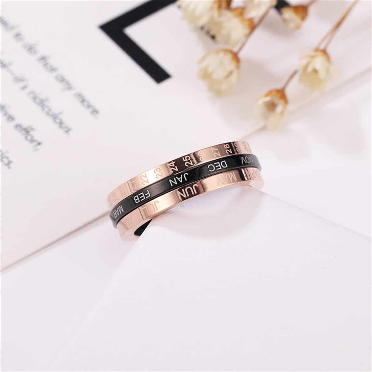 Black Acrylic & Rose Goldtone Calendar Ring