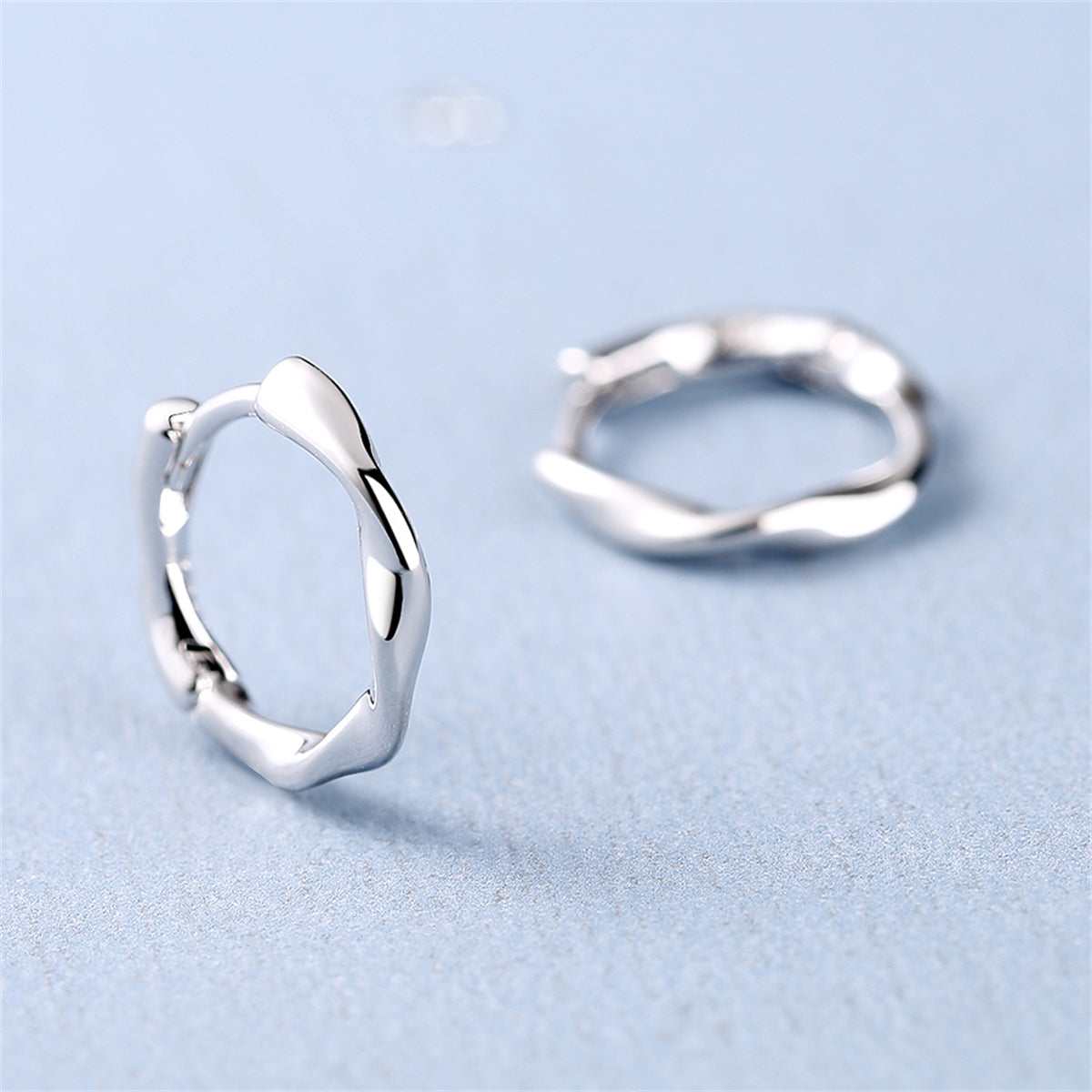Silvertone Wave Huggie Earring