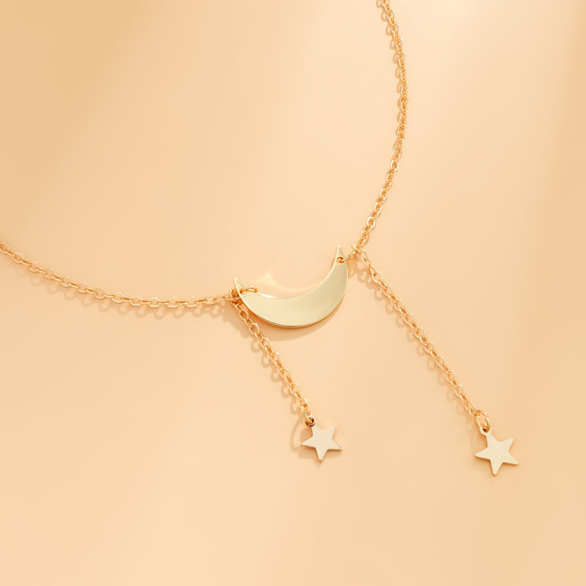 Goldtone Star & Moon Pendant Necklace