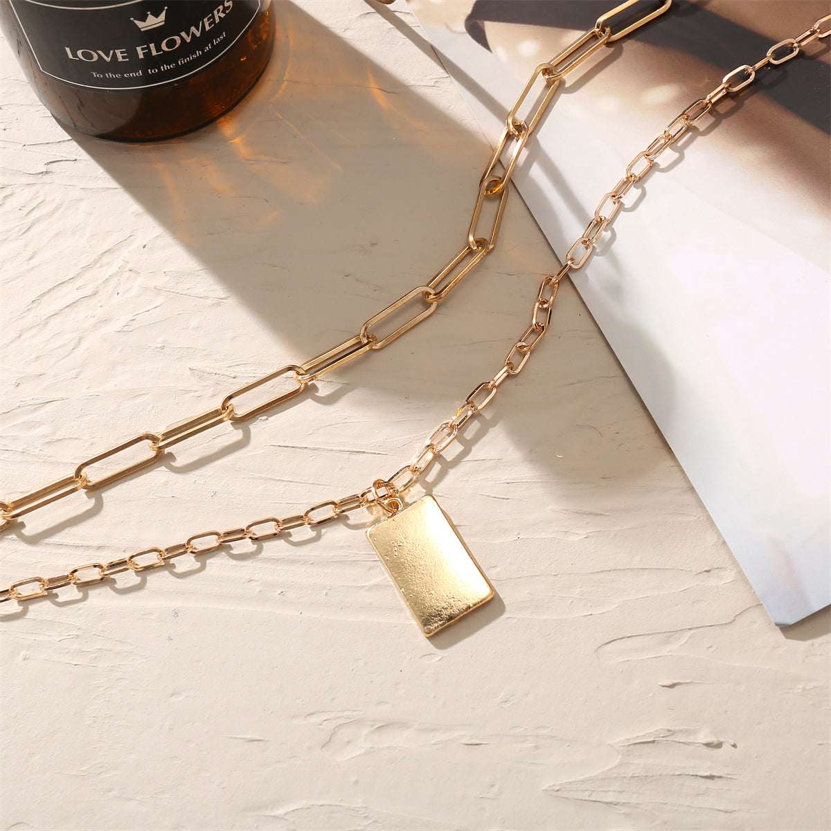 Goldtone Tag Pendant Necklace Set