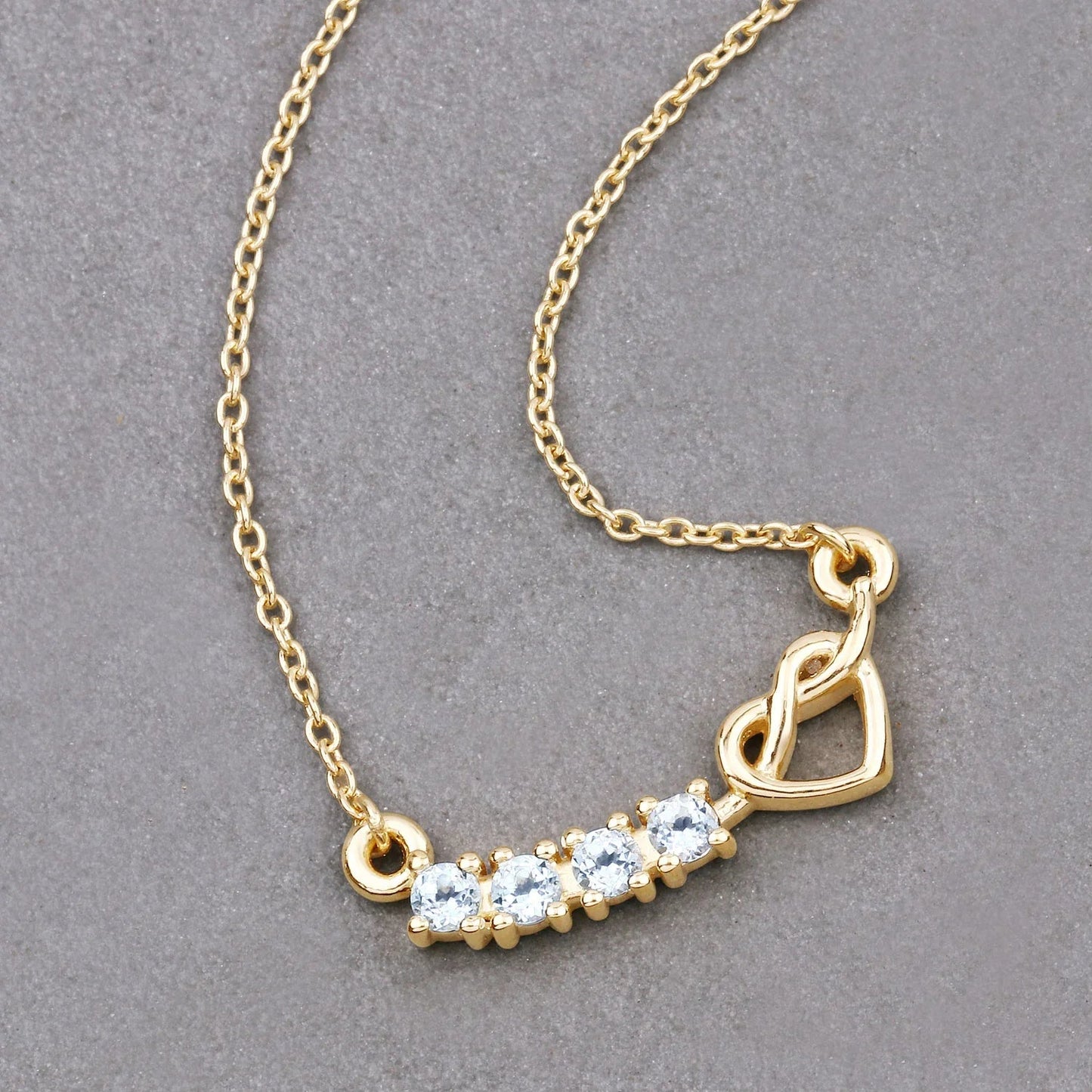 0.24 Ct Round Blue Aquamarine Prong 18K Gold Plated Silver Heart & Infinity Necklace