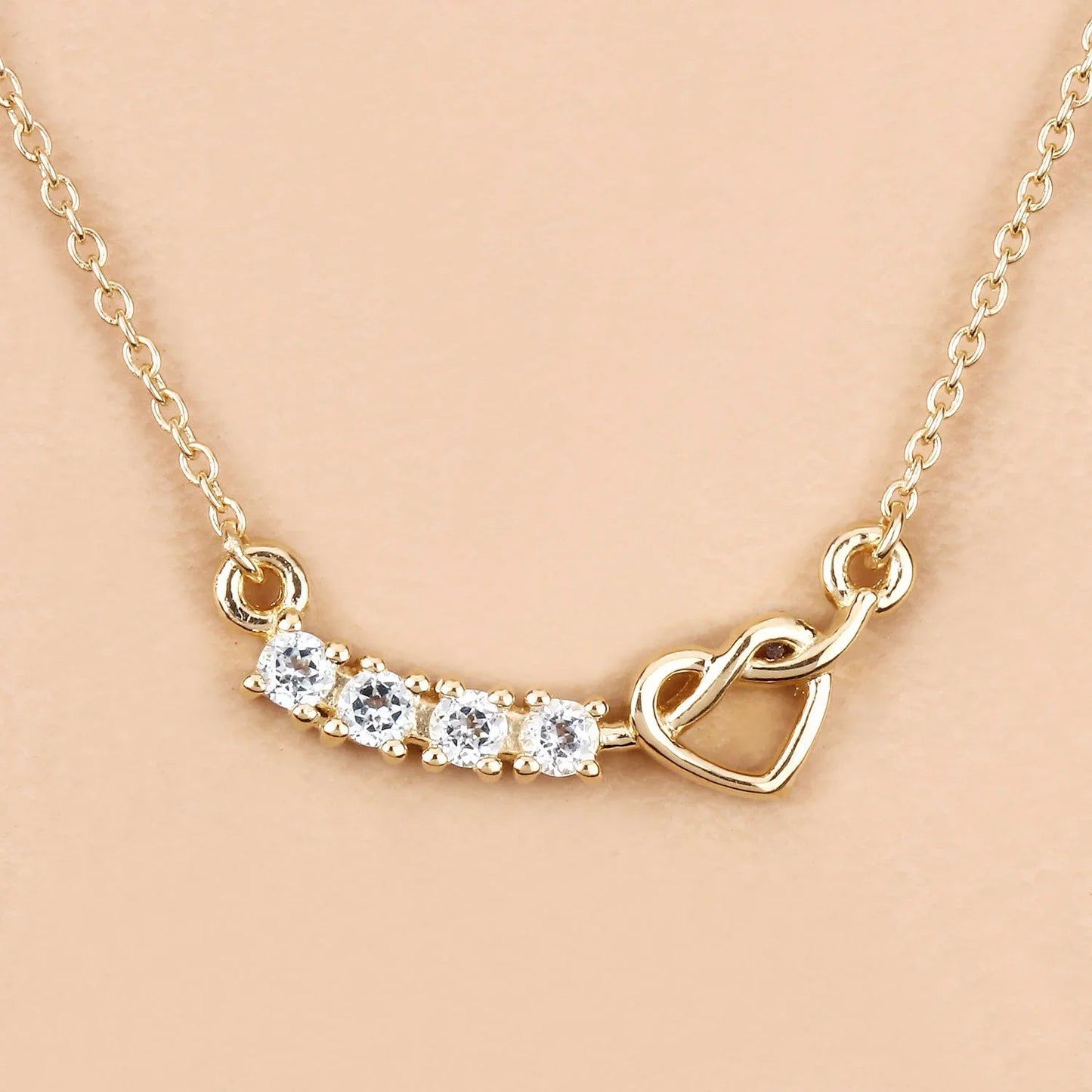 0.24 Ct Round Blue Aquamarine Prong 18K Gold Plated Silver Heart & Infinity Necklace