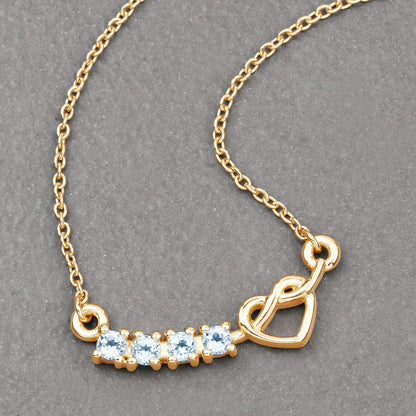 0.30 Ct Round Blue Topaz Prong 18K Gold Plated Silver Heart & Infinity Necklace