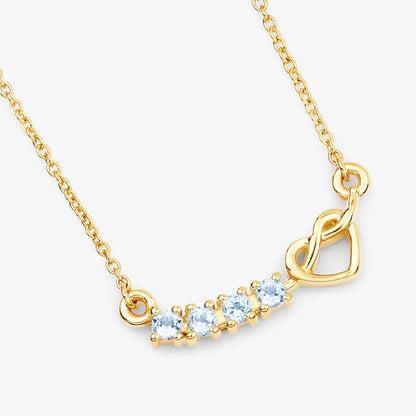 0.30 Ct Round Blue Topaz Prong 18K Gold Plated Silver Heart & Infinity Necklace