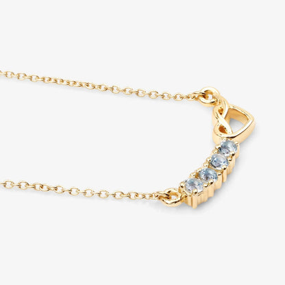 0.30 Ct Round Blue Topaz Prong 18K Gold Plated Silver Heart & Infinity Necklace