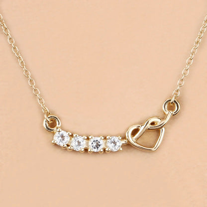 0.30 Ct Round Blue Topaz Prong 18K Gold Plated Silver Heart & Infinity Necklace