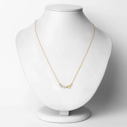 0.30 Ct Round Blue Topaz Prong 18K Gold Plated Silver Heart & Infinity Necklace