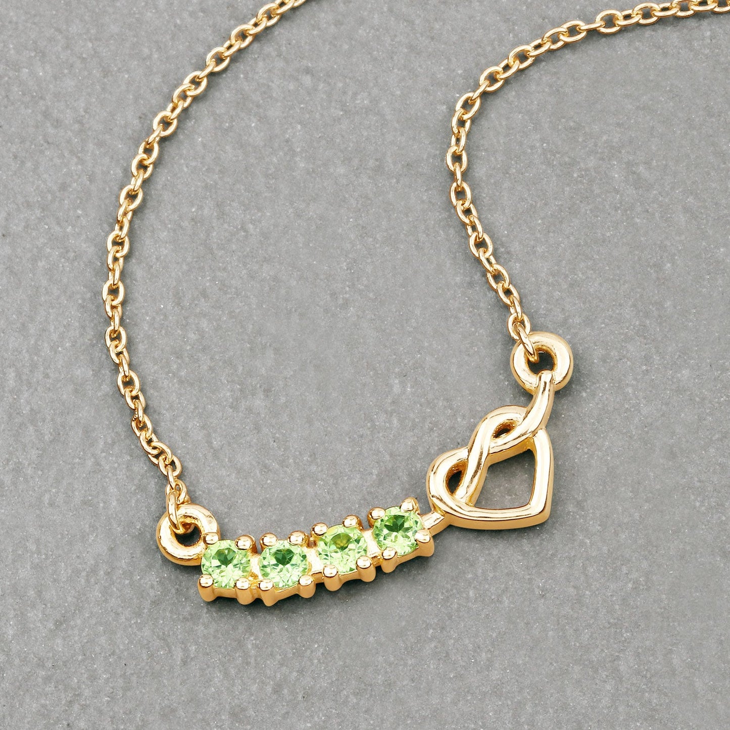 0.28 Ct Round Green Peridot Prong 18K Gold Plated Silver Heart & Infinity Necklace