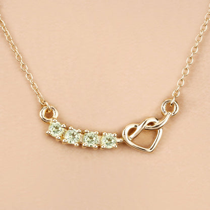 0.28 Ct Round Green Peridot Prong 18K Gold Plated Silver Heart & Infinity Necklace