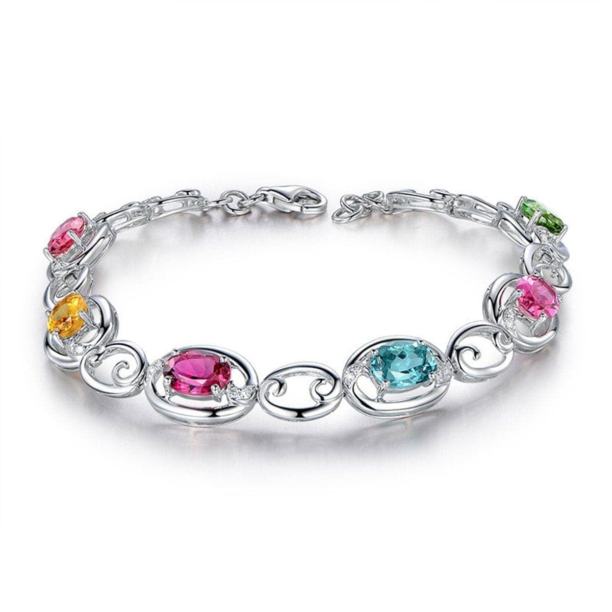 Pink Oval Crystal & Silvertone Station Bracelet