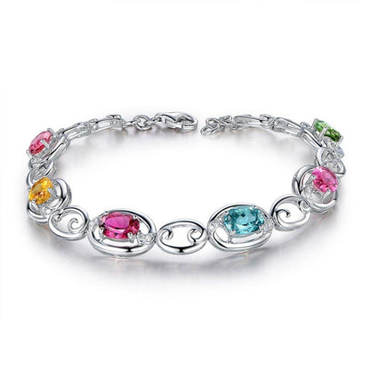 Pink Oval Crystal & Silvertone Station Bracelet