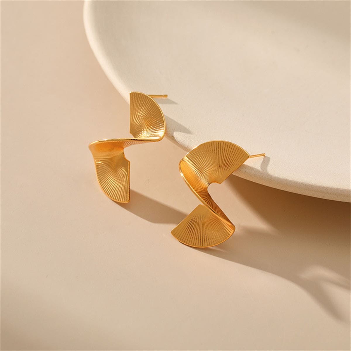 Goldtone 3D Spinning Stud Earrings