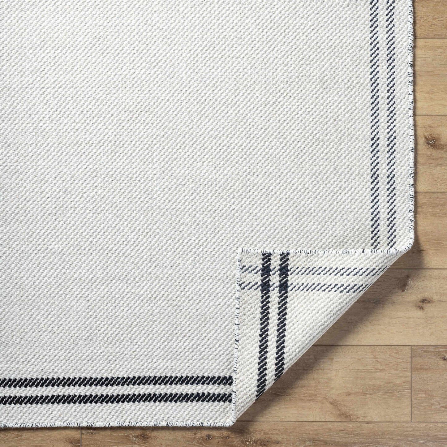 Nimue Cream & Blue Bordered Area Rug