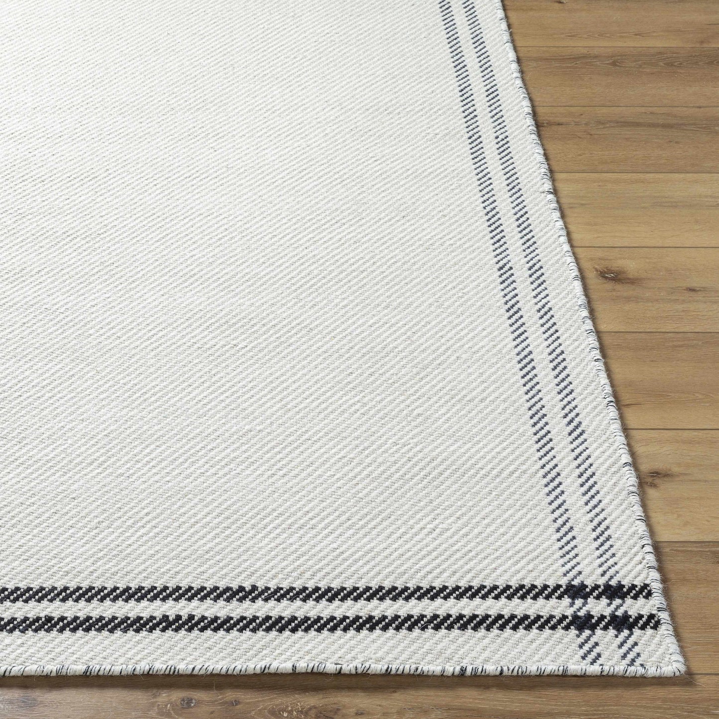 Nimue Cream & Blue Bordered Area Rug