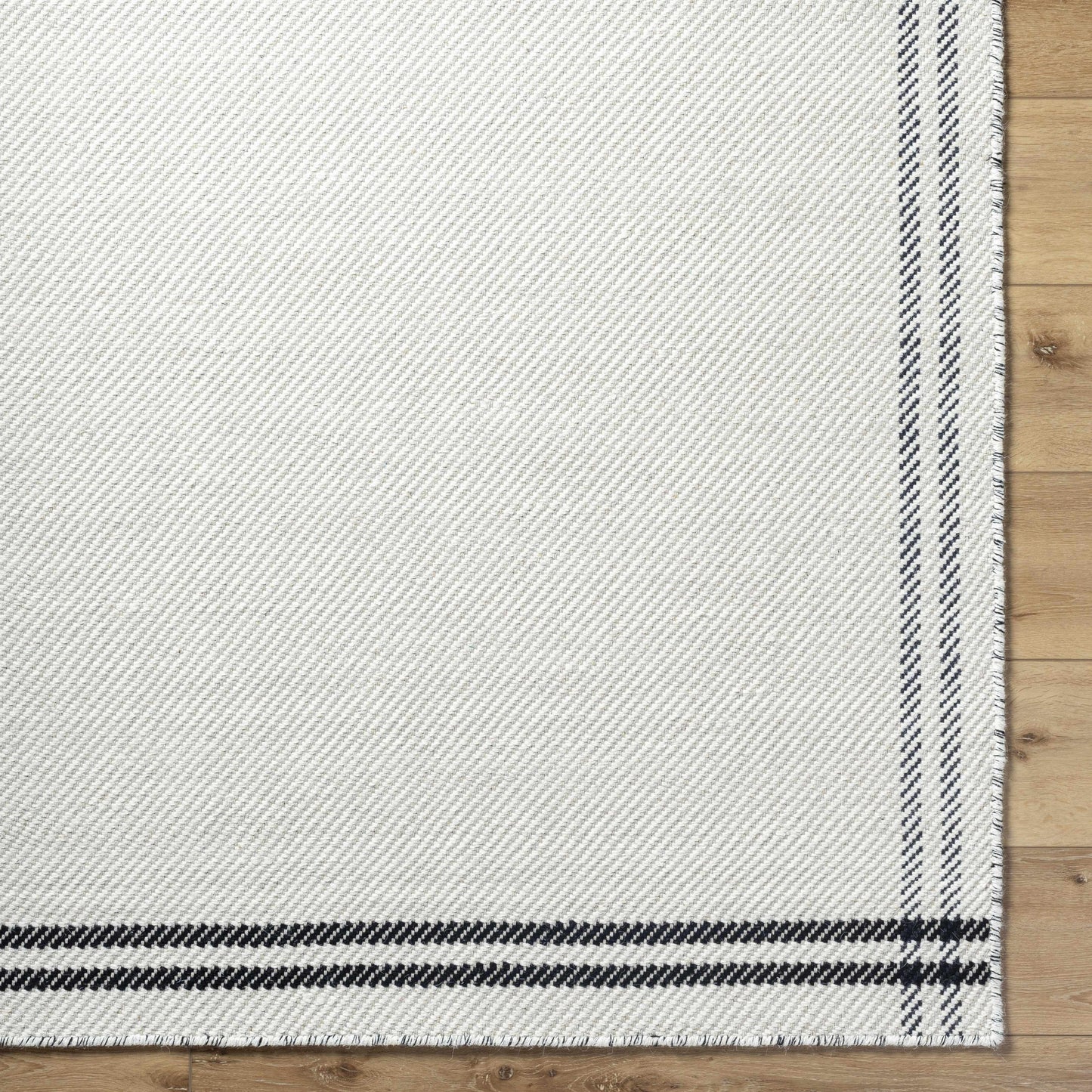 Nimue Cream & Blue Bordered Area Rug